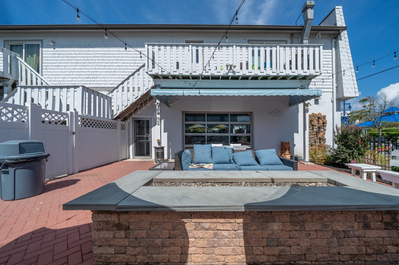 The outdoor patio alongside the restaurant at 2108 Dune Drive.