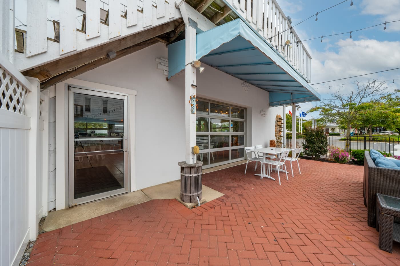 The outdoor patio alongside the restaurant at 2108 Dune Drive.