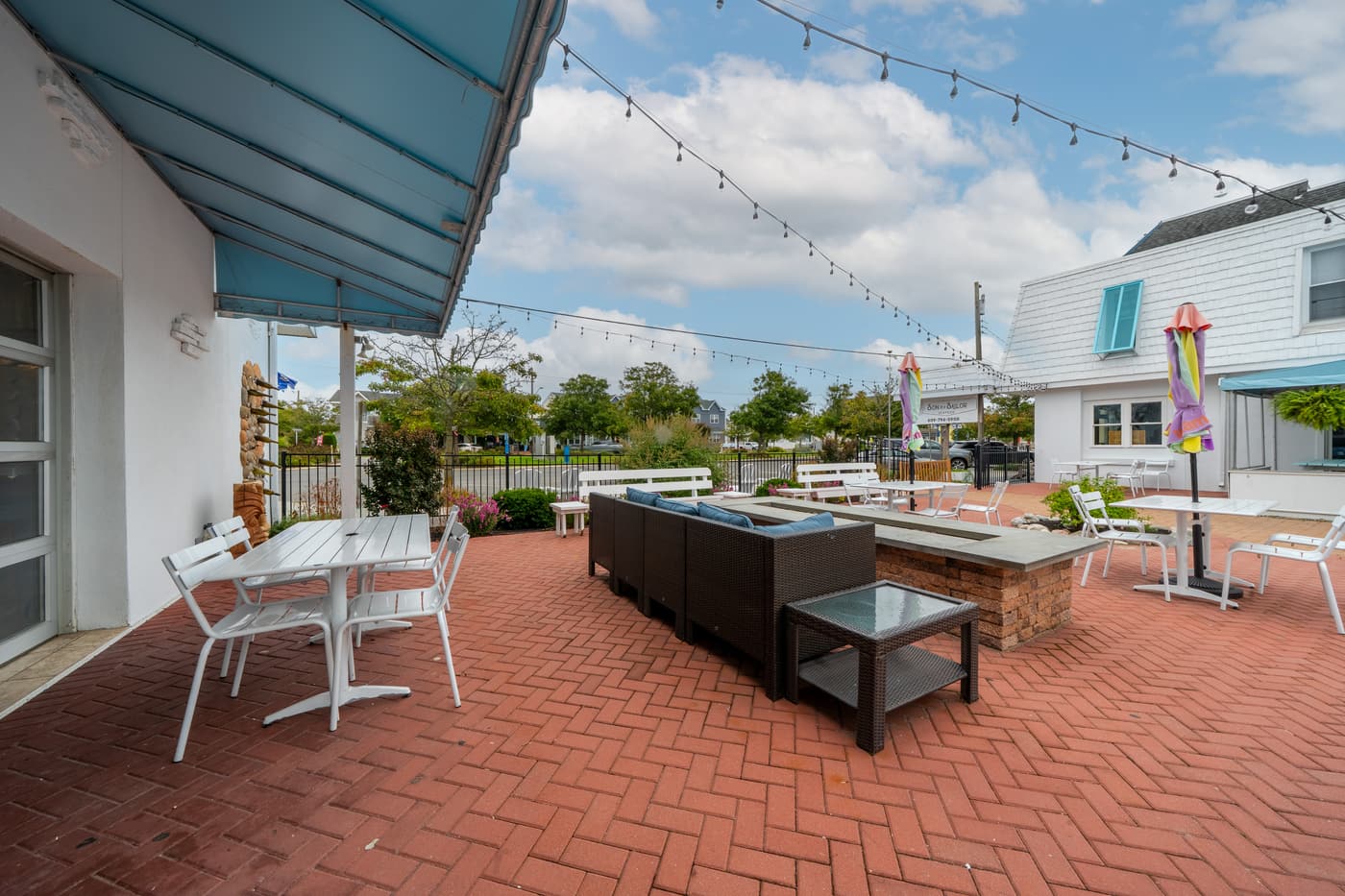 The outdoor patio alongside the restaurant at 2108 Dune Drive.