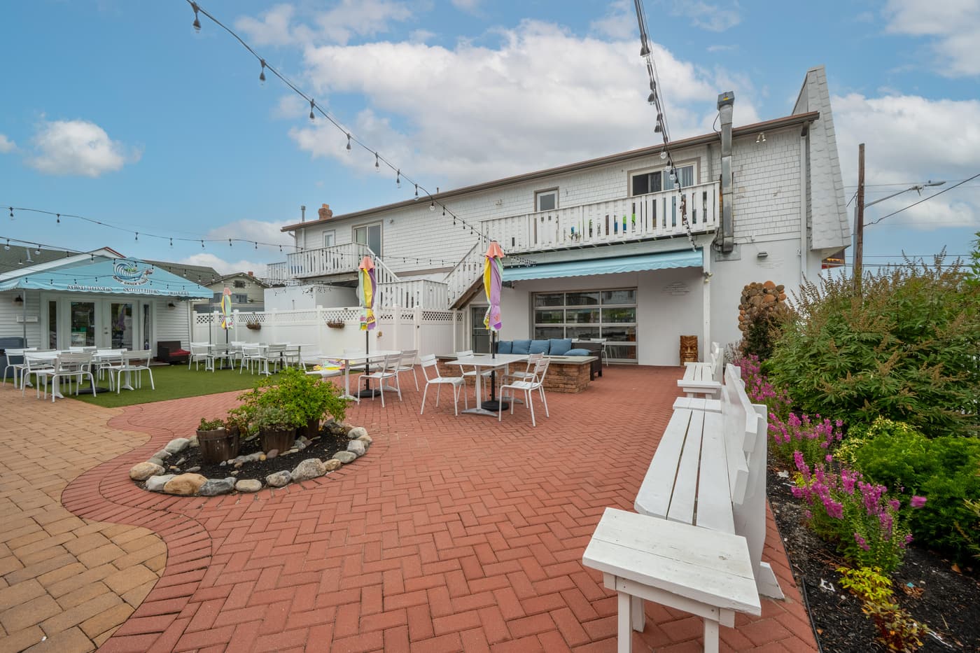 The outdoor patio alongside the restaurant at 2108 Dune Drive.