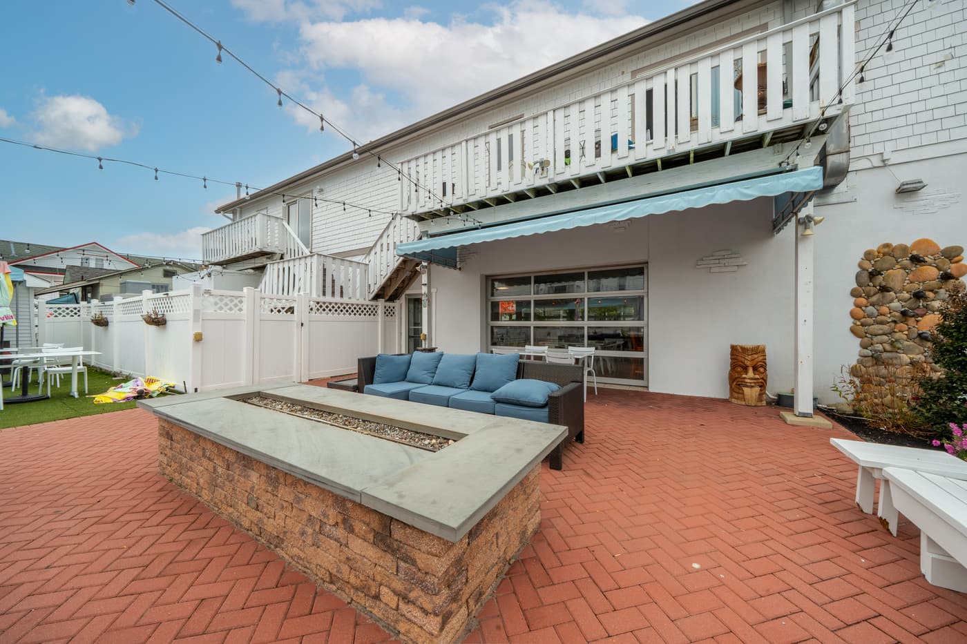 The outdoor patio alongside the restaurant at 2108 Dune Drive.