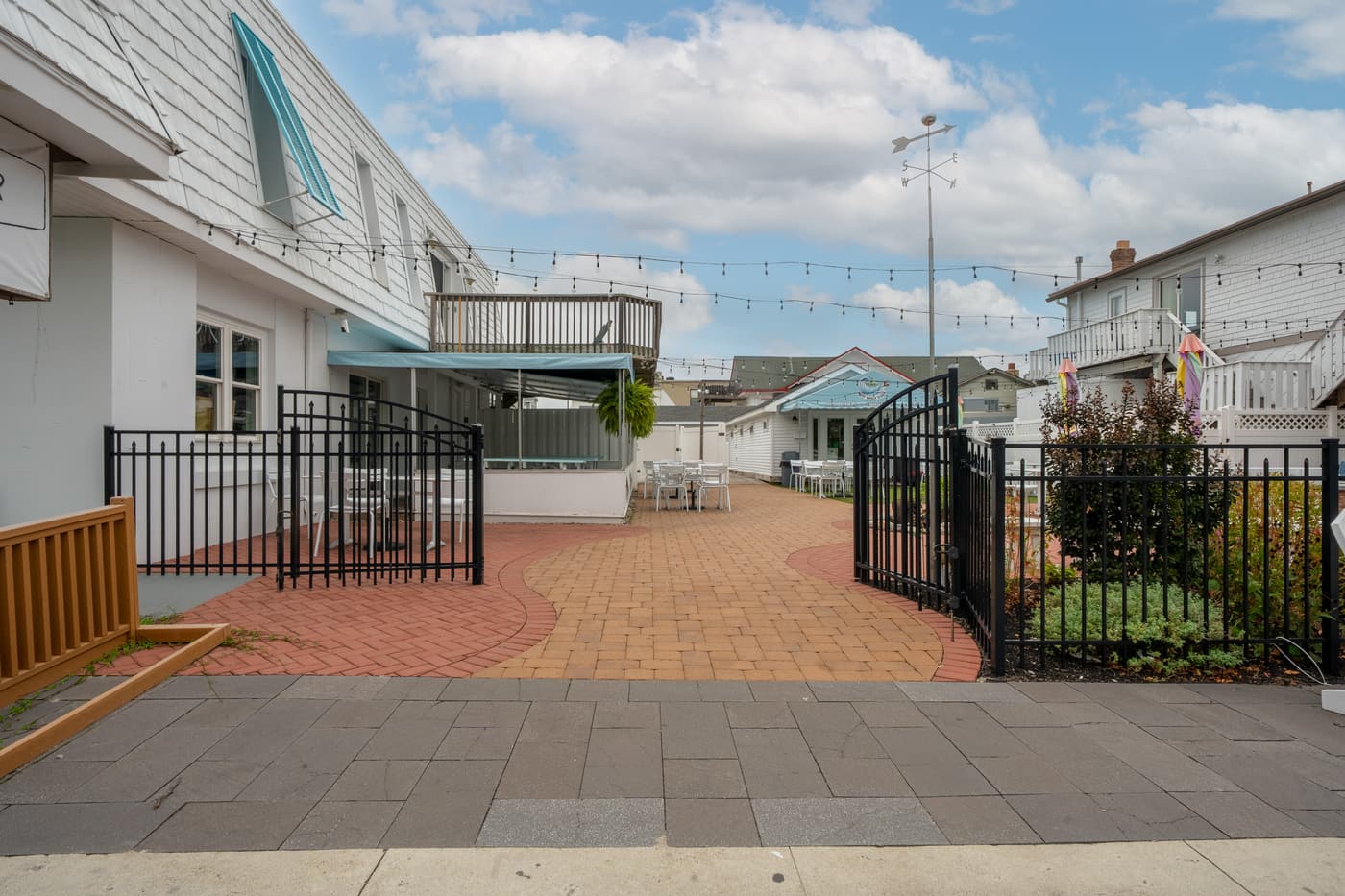 The outdoor patio alongside the restaurant at 2108 Dune Drive.