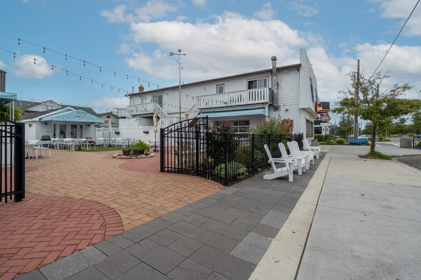 The outdoor patio alongside the restaurant at 2108 Dune Drive.